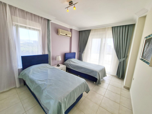 Меблированная квартира 2+1 с видом на город и частично на море в Махмутлар, 120 м2 - Ракурс 11