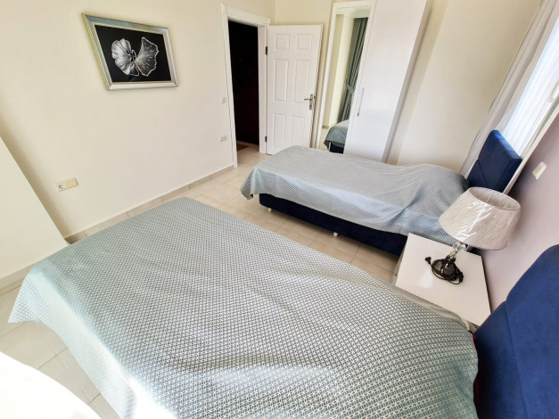 Меблированная квартира 2+1 с видом на город и частично на море в Махмутлар, 120 м2 - Ракурс 15