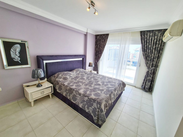 Меблированная квартира 2+1 с видом на город и частично на море в Махмутлар, 120 м2 - Ракурс 16