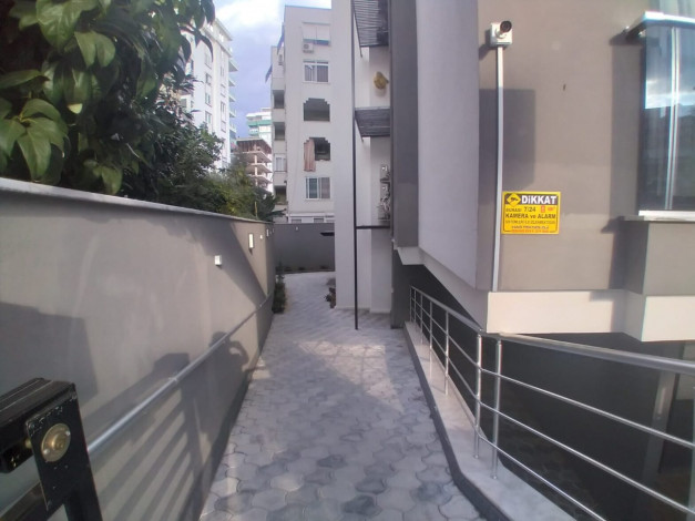 Квартира 1+1 в новом доме в 250 м от моря в Махмутлар, 60 м2 - Ракурс 5