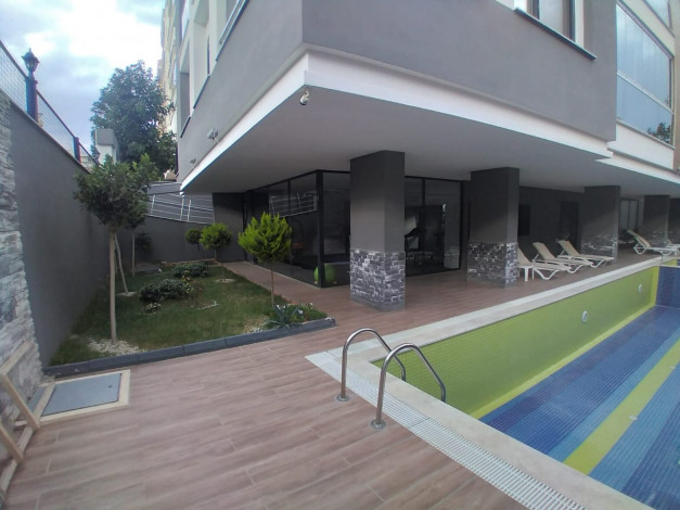 Квартира 1+1 в новом доме в 250 м от моря в Махмутлар, 60 м2 - Ракурс 10