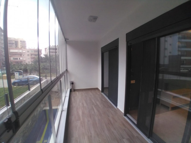 Квартира 1+1 в новом доме в 250 м от моря в Махмутлар, 60 м2 - Ракурс 28