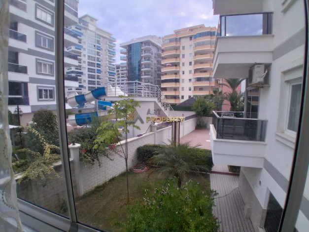 Квартира 1+1 в комплексе с инфраструктурой в начале района Махмутлар, 65 м2 - Ракурс 7