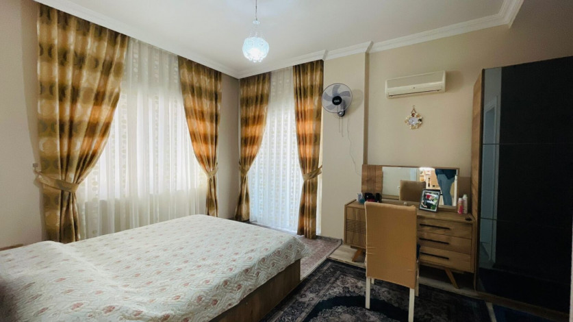 Меблированная трехкомнатная квартира в 300 метрах от моря в районе Махмутлар, 120 м2 - Ракурс 3