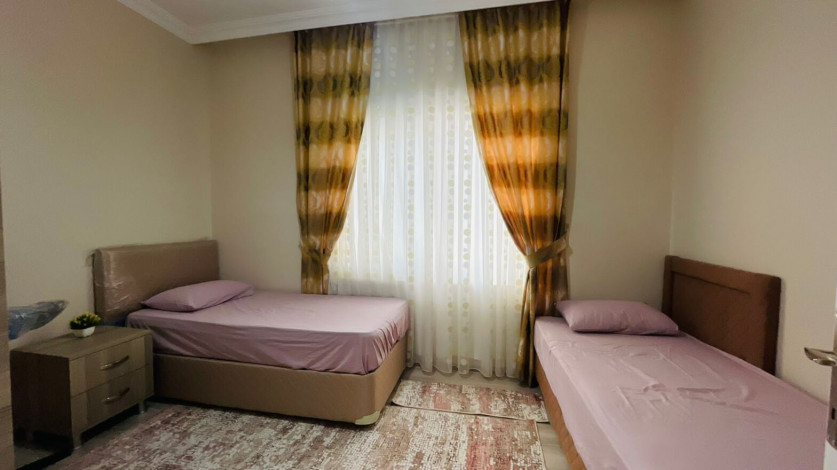 Меблированная трехкомнатная квартира в 300 метрах от моря в районе Махмутлар, 120 м2 - Ракурс 7