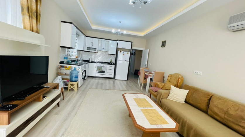 Меблированная трехкомнатная квартира в 300 метрах от моря в районе Махмутлар, 120 м2 - Ракурс 11