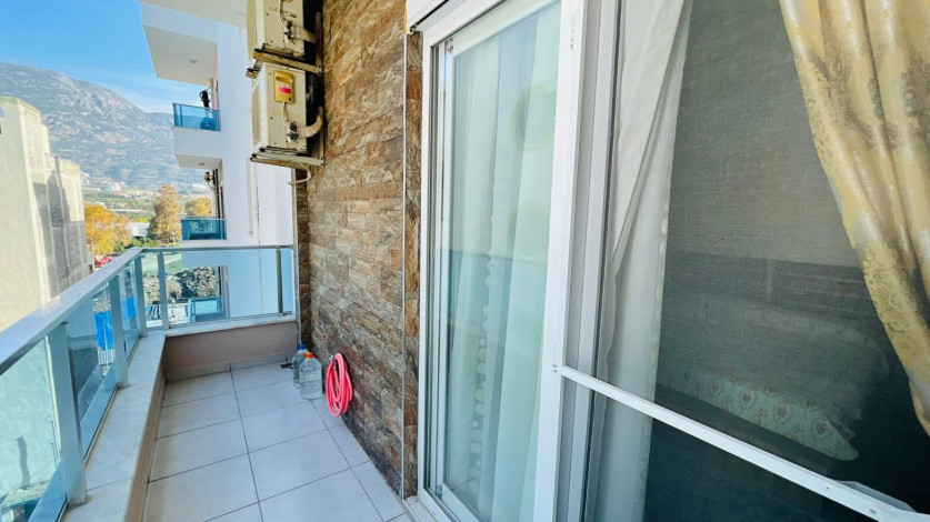 Меблированная трехкомнатная квартира в 300 метрах от моря в районе Махмутлар, 120 м2 - Ракурс 20