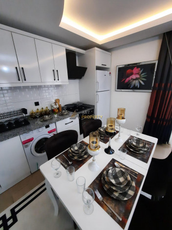 Квартира 2+1 с новой мебелью вблизи моря в Махмутларе, 90 м2 - Ракурс 13