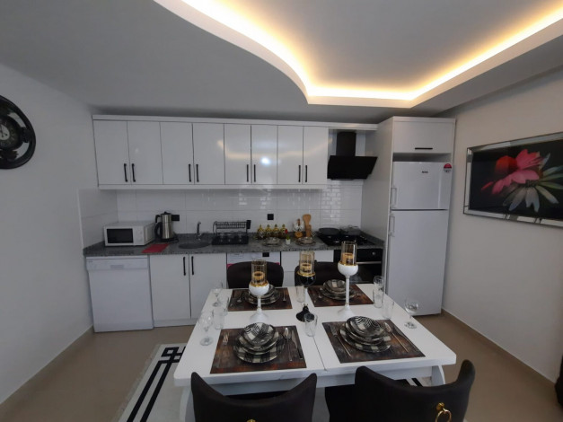 Квартира 2+1 с новой мебелью вблизи моря в Махмутларе, 90 м2 - Ракурс 14