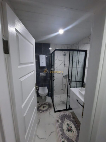 Квартира 2+1 с новой мебелью вблизи моря в Махмутларе, 90 м2 - Ракурс 23