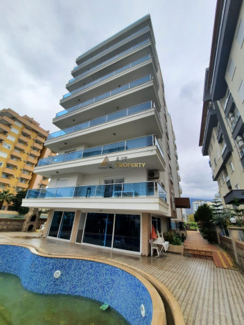 Квартира 2+1 с новой мебелью вблизи моря в Махмутларе, 90 м2 - Ракурс 25