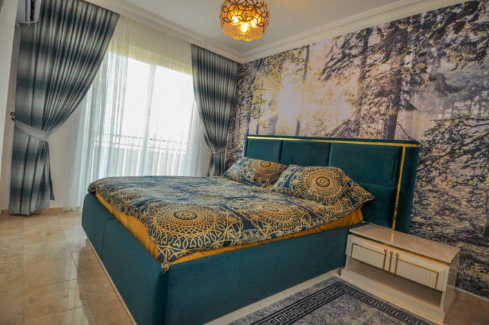 Четырехкомнатная квартира в центре Махмутлара в 100 метрах от Средиземного моря, 135 м2 - Ракурс 9