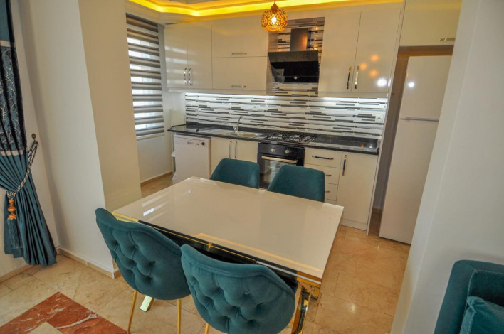 Четырехкомнатная квартира в центре Махмутлара в 100 метрах от Средиземного моря, 135 м2 - Ракурс 13