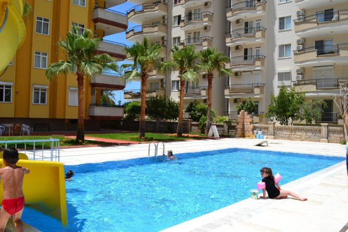 Четырехкомнатная квартира на улице Барбаросса района Махмутлар с частичным видом на море и горы, 130 м2 - Ракурс 3