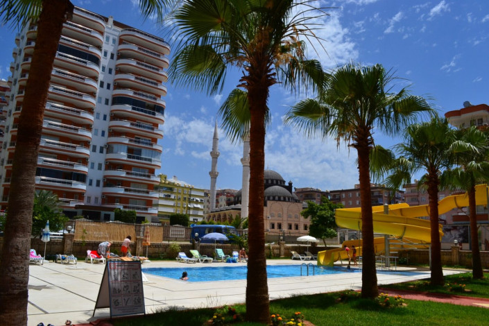 Четырехкомнатная квартира на улице Барбаросса района Махмутлар с частичным видом на море и горы, 130 м2 - Ракурс 4