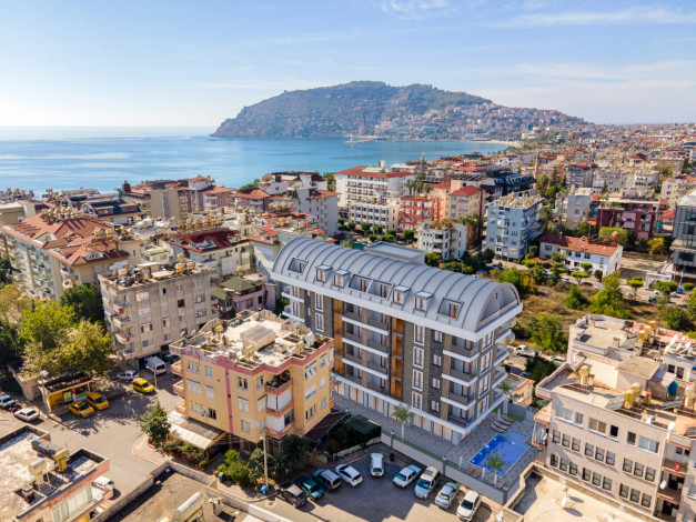 Новый комплекс на этапе строительства в центральной части Алании, 51-165 м2 - Ракурс 2