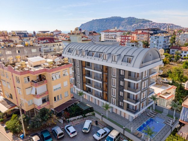 Новый комплекс на этапе строительства в центральной части Алании, 51-165 м2 - Ракурс 3