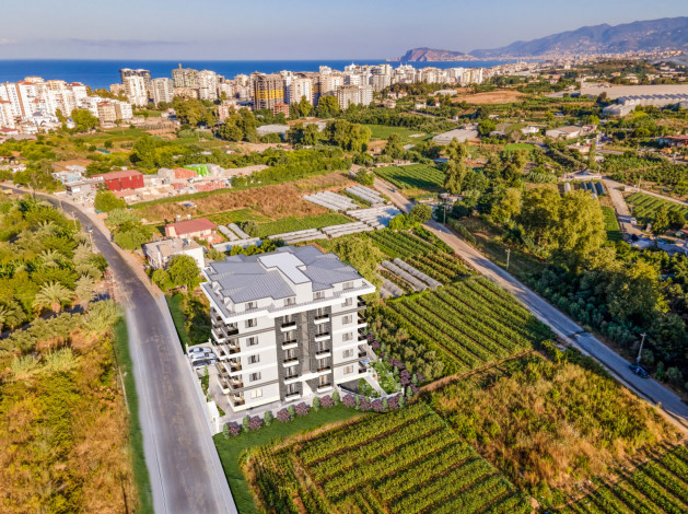 Комплекс на этапе строительства в живописном месте района Махмутлар, 45-95 м2 - Ракурс 2