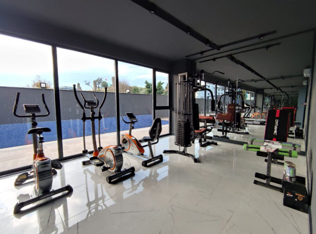 Двухкомнатная квартира в новом комплексе на побережье Средиземного моря в районе Махмутлар, 55 м2 - Ракурс 5