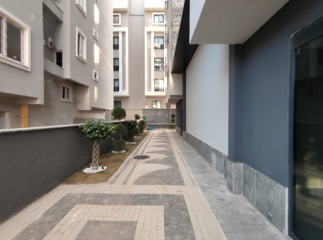 Двухкомнатная квартира в новом комплексе на побережье Средиземного моря в районе Махмутлар, 55 м2 - Ракурс 10