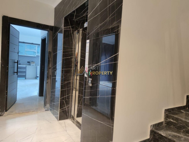 Двухкомнатная квартира в новом комплексе на побережье Средиземного моря в районе Махмутлар, 55 м2 - Ракурс 13