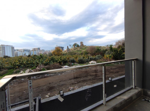 Двухкомнатная квартира в новом комплексе на побережье Средиземного моря в районе Махмутлар, 55 м2 - Ракурс 17