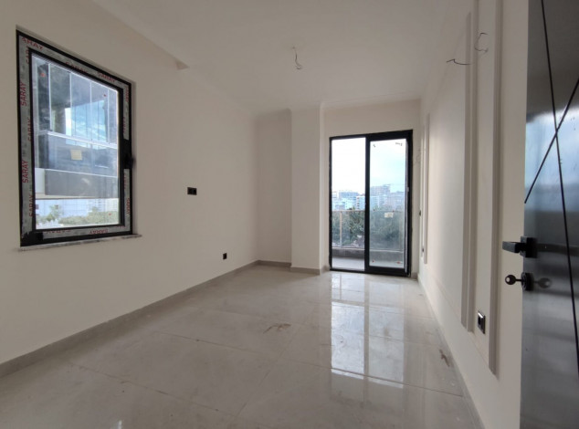 Двухкомнатная квартира в новом комплексе на побережье Средиземного моря в районе Махмутлар, 55 м2 - Ракурс 22