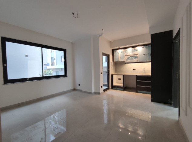 Двухкомнатная квартира в новом комплексе на побережье Средиземного моря в районе Махмутлар, 55 м2 - Ракурс 25