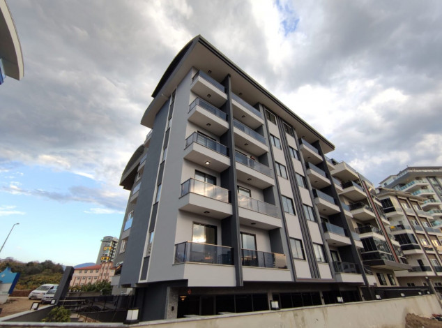 Двухкомнатная квартира в новом комплексе на побережье Средиземного моря в районе Махмутлар, 55 м2 - Ракурс 26