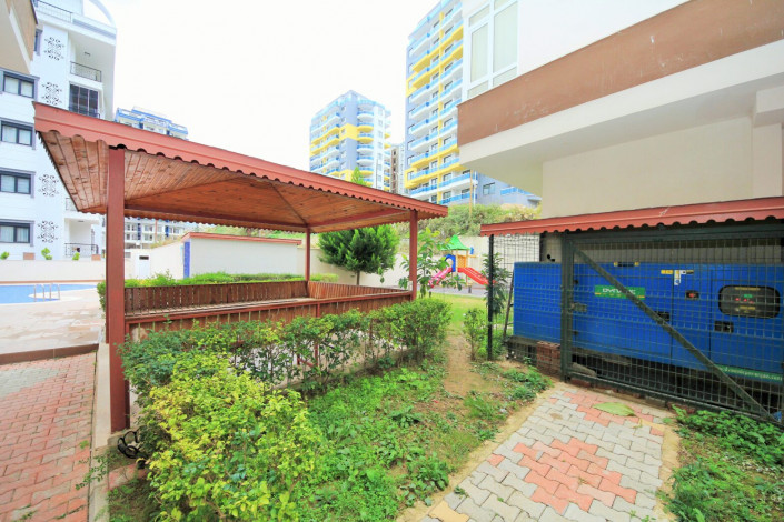 Меблированная двухкомнатная квартира с отдельной кухней в районе Махмутлар, 120м - Ракурс 3