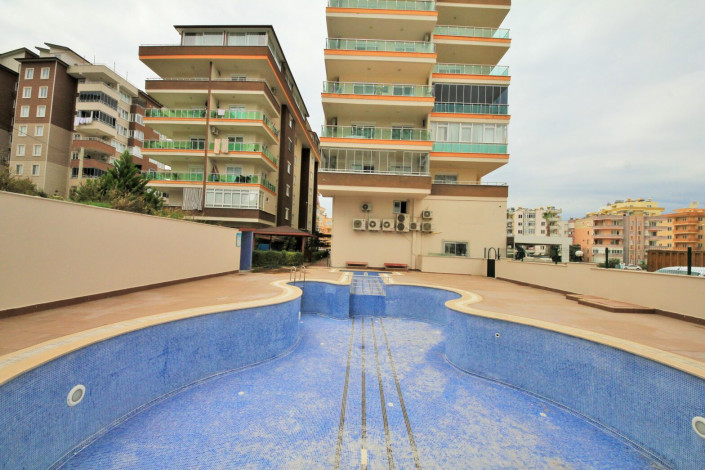 Меблированная двухкомнатная квартира с отдельной кухней в районе Махмутлар, 120м - Ракурс 4