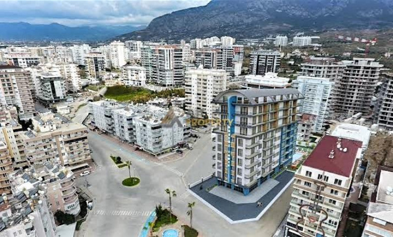 Меблированная двухкомнатная квартира с отдельной кухней в районе Махмутлар, 120м - Ракурс 5