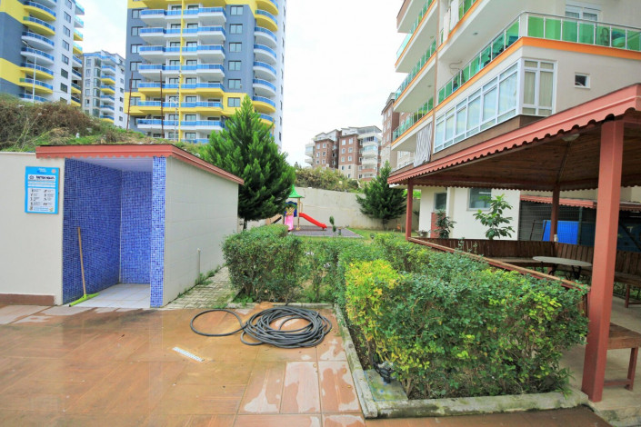 Меблированная двухкомнатная квартира с отдельной кухней в районе Махмутлар, 120м - Ракурс 6