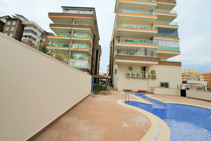 Меблированная двухкомнатная квартира с отдельной кухней в районе Махмутлар, 120м - Ракурс 8