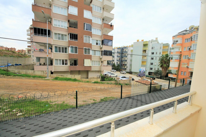 Меблированная двухкомнатная квартира с отдельной кухней в районе Махмутлар, 120м - Ракурс 11