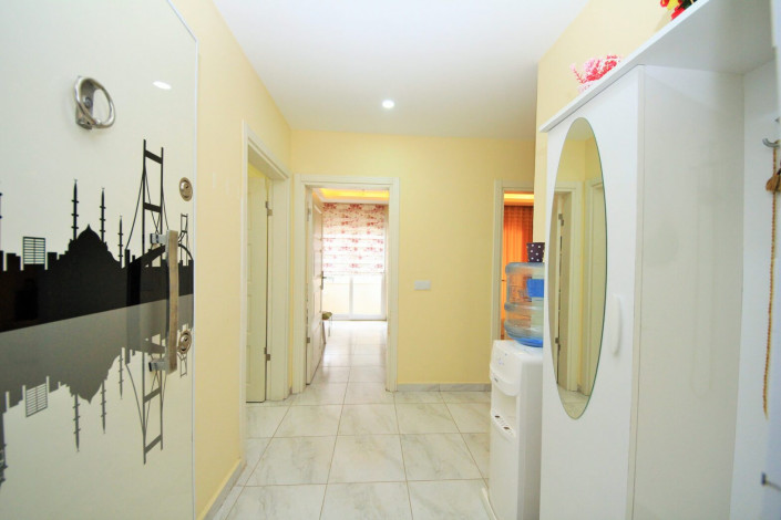 Меблированная двухкомнатная квартира с отдельной кухней в районе Махмутлар, 120м - Ракурс 12