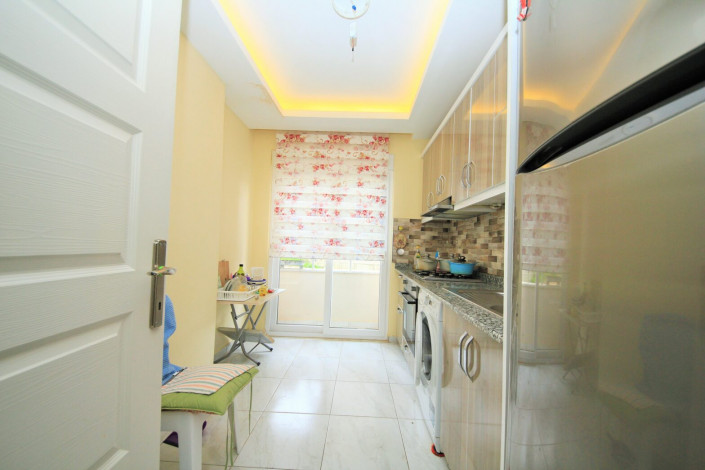 Меблированная двухкомнатная квартира с отдельной кухней в районе Махмутлар, 120м - Ракурс 18