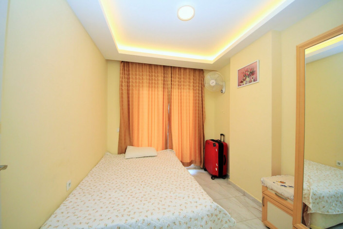 Меблированная двухкомнатная квартира с отдельной кухней в районе Махмутлар, 120м - Ракурс 19