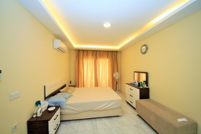 Меблированная двухкомнатная квартира с отдельной кухней в районе Махмутлар, 120м - Ракурс 20