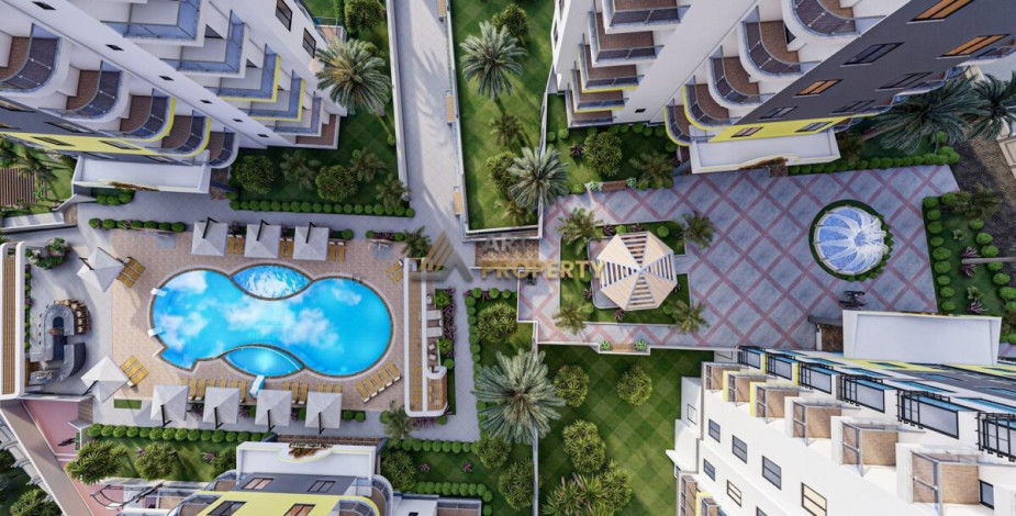 Двухкомнатная квартира большой площади в строящемся элитном комплексе в районе Махмутлар, 80 м2 - Ракурс 6