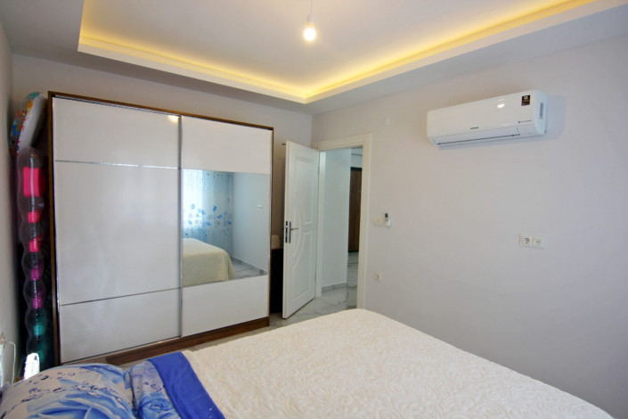 Квартира 1+1 с мебелью в самом центре Махмутлара, 60 м2 - Ракурс 11