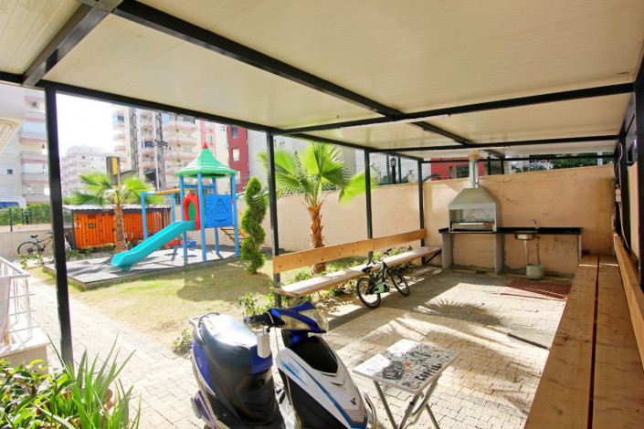 Квартира 1+1 с мебелью в самом центре Махмутлара, 60 м2 - Ракурс 15