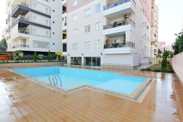 Квартира 1+1 с мебелью в самом центре Махмутлара, 60 м2 - Ракурс 16