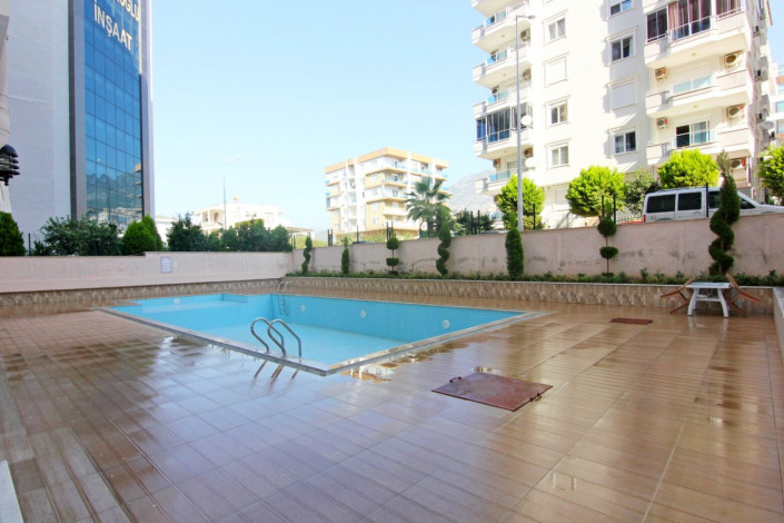 Квартира 1+1 с мебелью в самом центре Махмутлара, 60 м2 - Ракурс 17