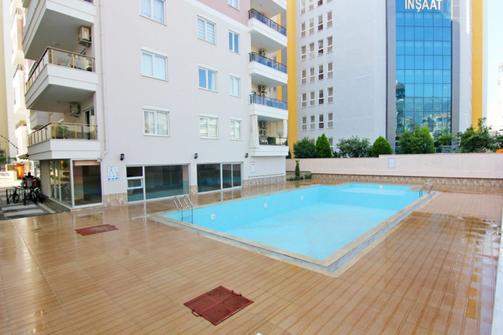 Квартира 1+1 с мебелью в самом центре Махмутлара, 60 м2 - Ракурс 18