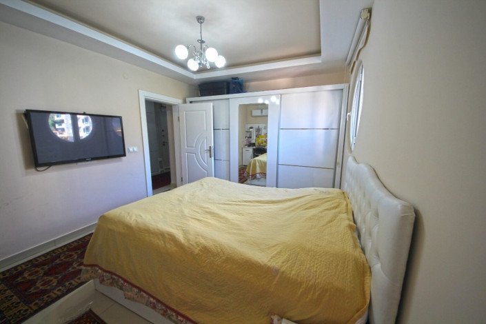 Квартира 1+1 в центральной части Махмутлара с отличной планировкой с мебелью, 70 м2 - Ракурс 5