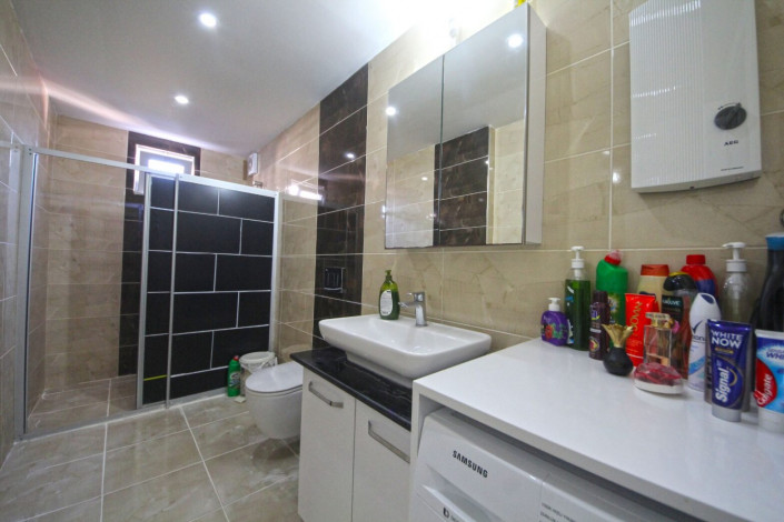 Квартира 1+1 в центральной части Махмутлара с отличной планировкой с мебелью, 70 м2 - Ракурс 6