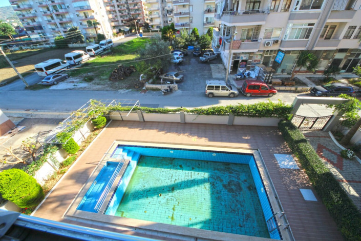 Квартира 1+1 в центральной части Махмутлара с отличной планировкой с мебелью, 70 м2 - Ракурс 15