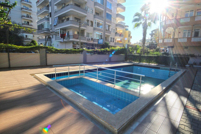 Квартира 1+1 в центральной части Махмутлара с отличной планировкой с мебелью, 70 м2 - Ракурс 28