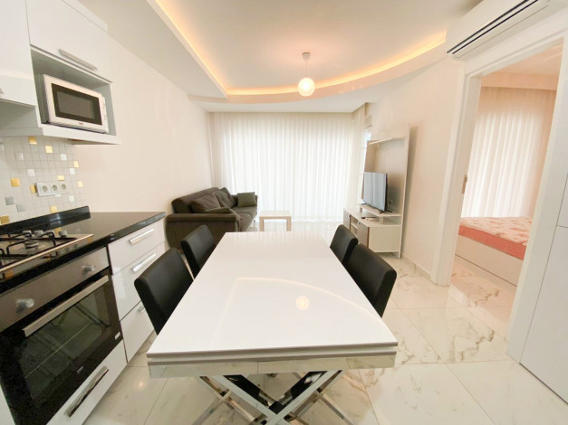 Квартира 1+1 с мебелью в комплексе с развитой инфраструктурой в центре Авсаллара, 60 м2 - Ракурс 9